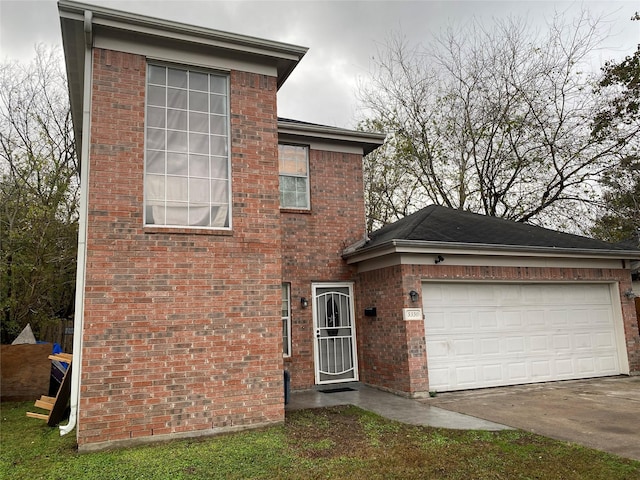 view of front of property with a garage