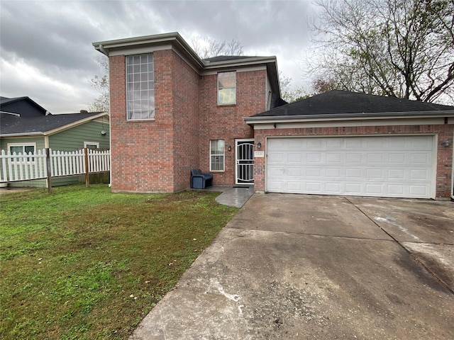 view of front facade featuring a front lawn and a garage