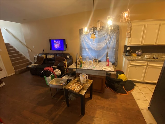 dining space featuring light tile patterned floors