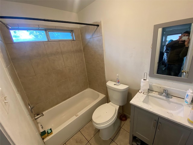 full bathroom with tile patterned flooring, vanity, toilet, and tiled shower / bath