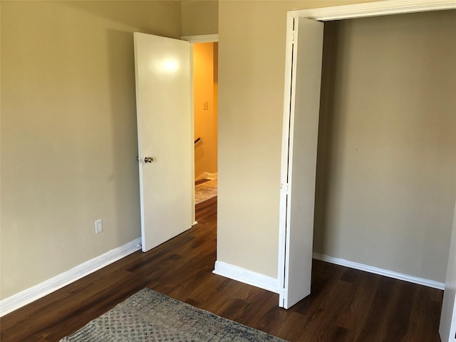 bedroom featuring dark wood-type flooring