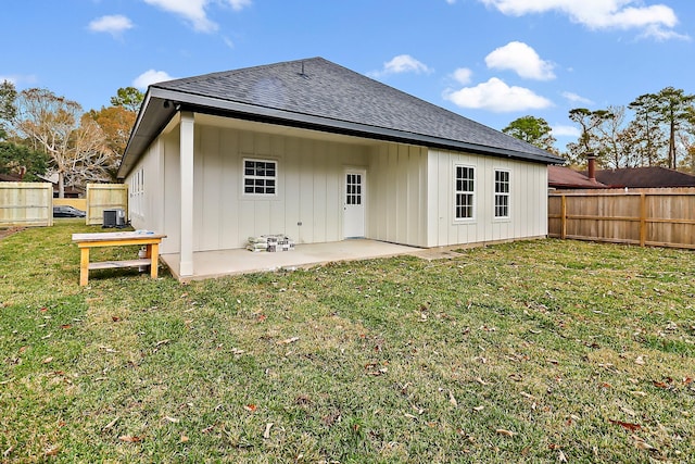 back of house with a yard, a patio, and cooling unit