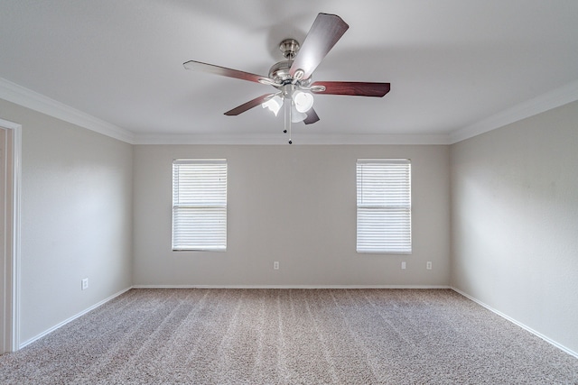 unfurnished room with carpet, plenty of natural light, and ornamental molding