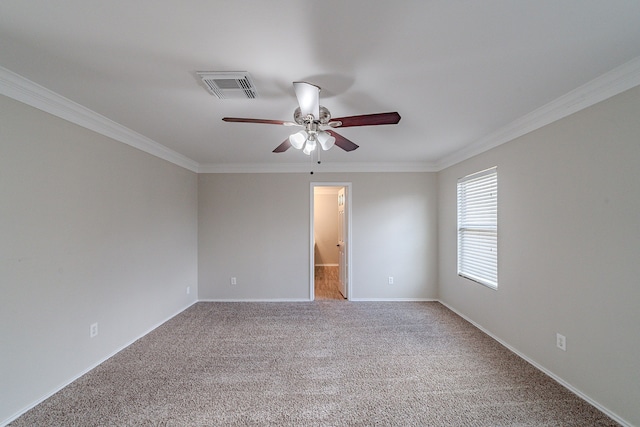 unfurnished room with carpet and ornamental molding