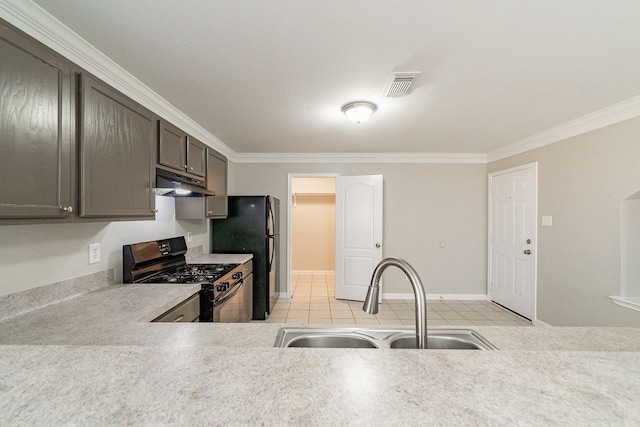 kitchen with black appliances, sink, ornamental molding, a textured ceiling, and light tile patterned flooring