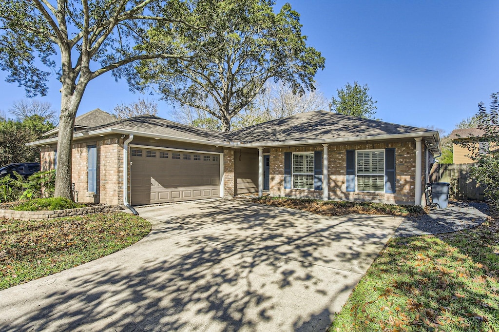 single story home with a garage