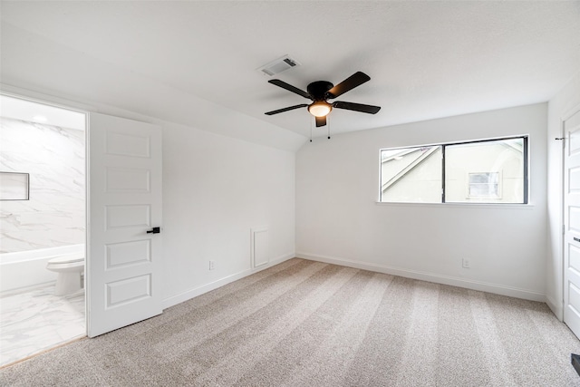 spare room with carpet flooring and ceiling fan