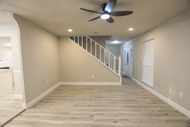 interior space featuring ceiling fan and light hardwood / wood-style flooring