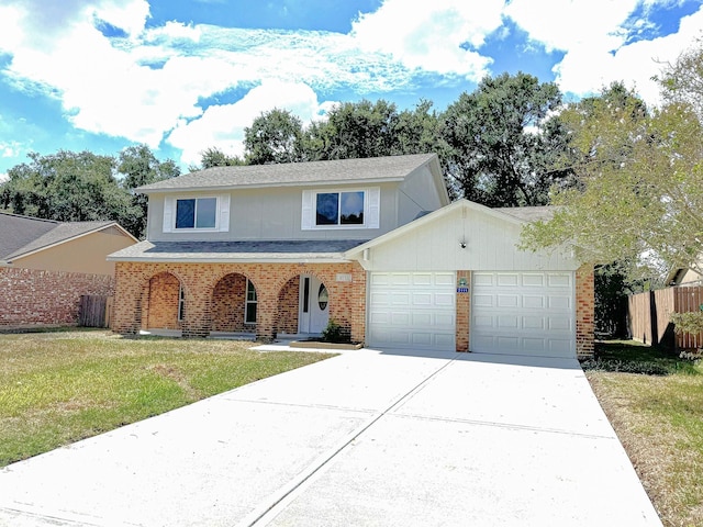 view of front facade with a front lawn, covered porch, and a garage