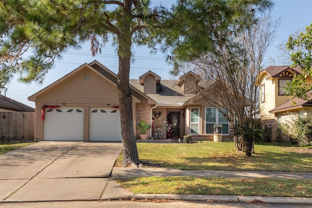 view of front facade featuring a front yard and a garage