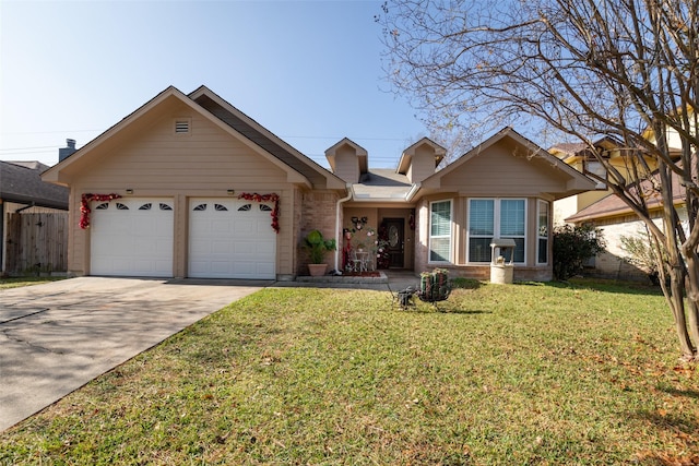 ranch-style house with a garage and a front lawn