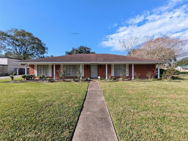 ranch-style house with a front lawn