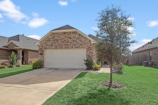 view of front of property featuring a garage, central air condition unit, and a front lawn