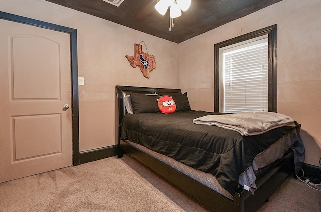 bedroom featuring ceiling fan and carpet floors