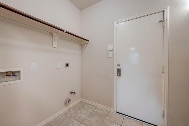 clothes washing area featuring electric dryer hookup, hookup for a gas dryer, light tile patterned floors, and washer hookup