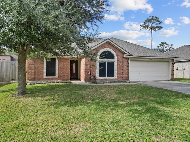 ranch-style home with a front lawn and a garage