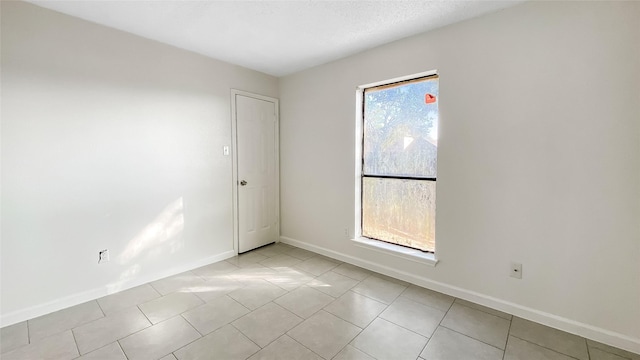 view of tiled empty room