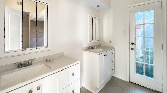 bathroom featuring vanity and tile patterned floors