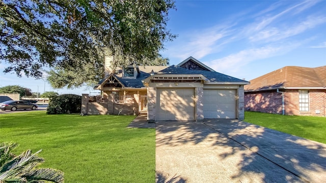 view of front of house with a front yard and a garage