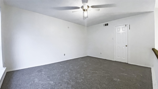 carpeted empty room with ceiling fan