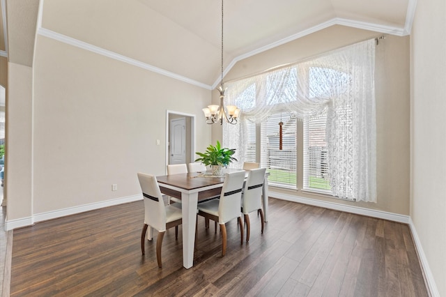 dining room featuring a notable chandelier, crown molding, lofted ceiling, and dark wood-type flooring