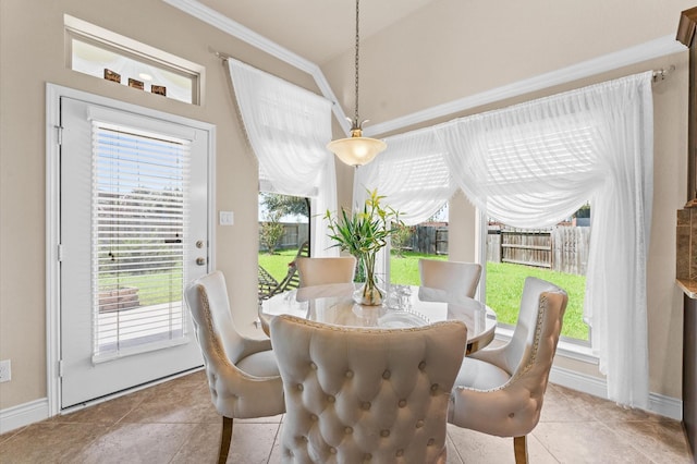 tiled dining area with crown molding