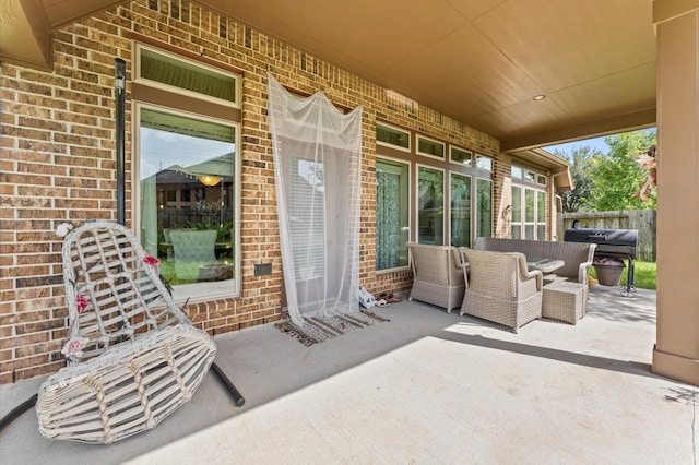 view of patio / terrace with outdoor lounge area and grilling area