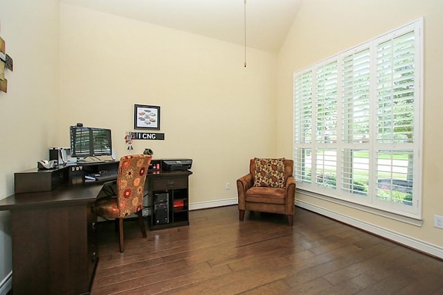 office with lofted ceiling and dark hardwood / wood-style floors