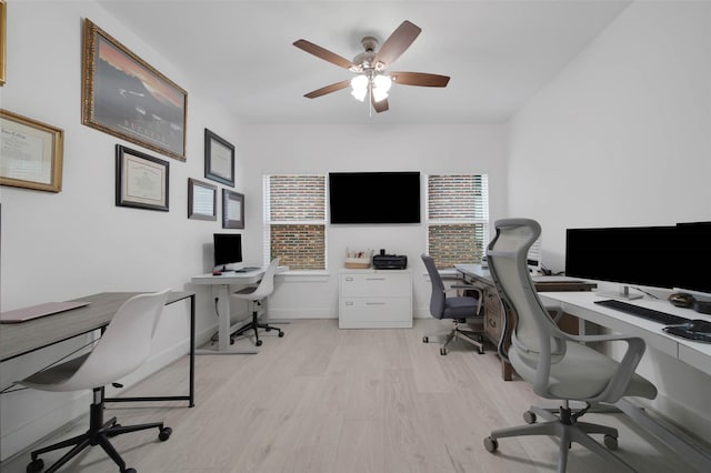 home office featuring a wealth of natural light and light wood-type flooring