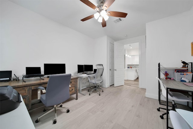 office area featuring ceiling fan and light hardwood / wood-style flooring