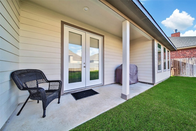 exterior space featuring french doors and area for grilling