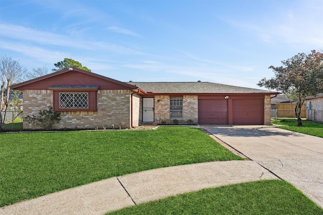 single story home with a garage and a front lawn