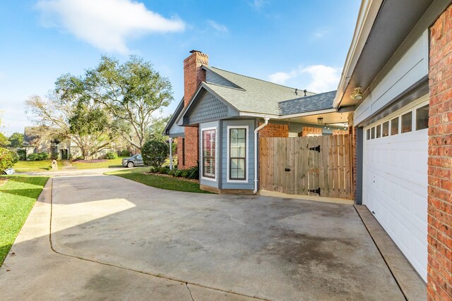 view of home's exterior with a garage