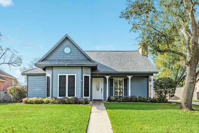 view of front of home with a front yard