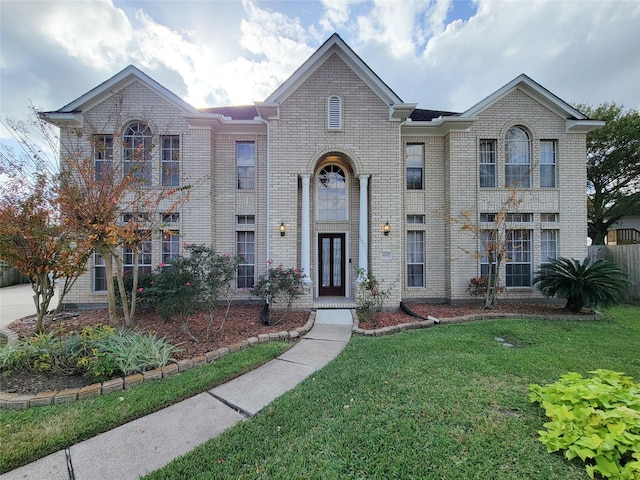 view of front of house with a front lawn