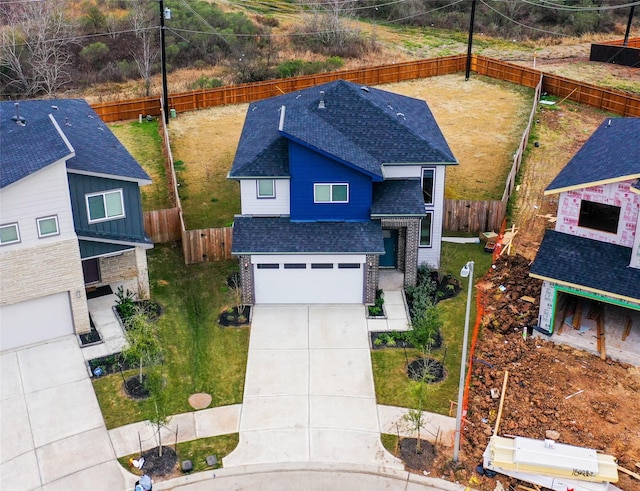 view of front of property with a garage