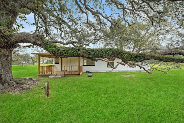 view of yard featuring a deck