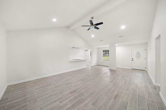 unfurnished living room featuring vaulted ceiling with beams, ceiling fan, and light hardwood / wood-style flooring