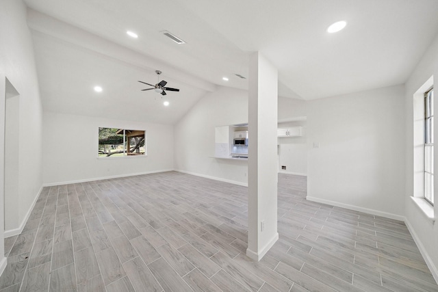 unfurnished living room with ceiling fan, light hardwood / wood-style floors, and lofted ceiling