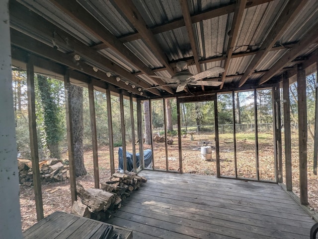 unfurnished sunroom with plenty of natural light