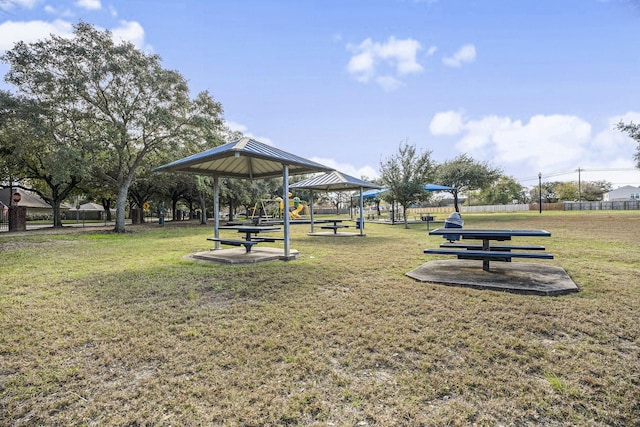 view of property's community with a gazebo and a lawn