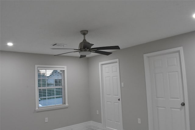 empty room with ceiling fan