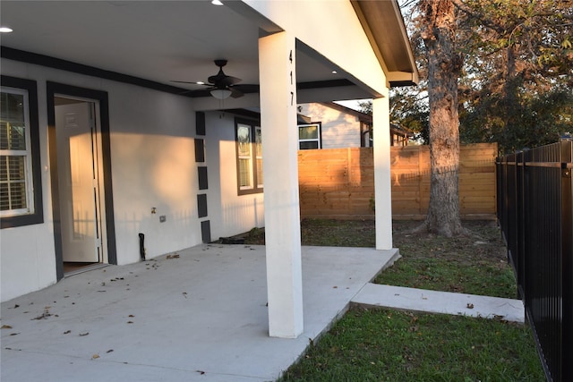 view of patio / terrace featuring ceiling fan