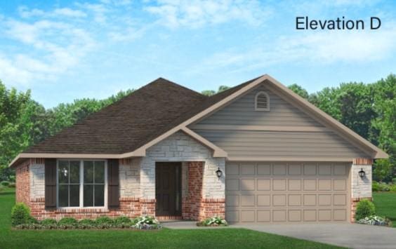 view of front of home featuring a front yard and a garage