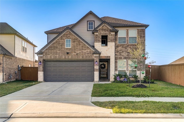 front facade with a front yard and a garage