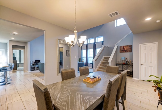 dining area featuring a chandelier