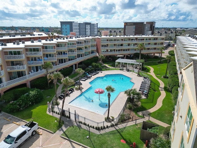 view of swimming pool with a patio area