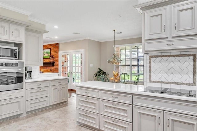 kitchen with french doors, crown molding, decorative backsplash, light tile patterned floors, and appliances with stainless steel finishes