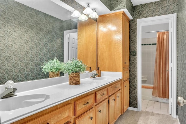 bathroom with tile patterned floors, shower / tub combo with curtain, and vanity