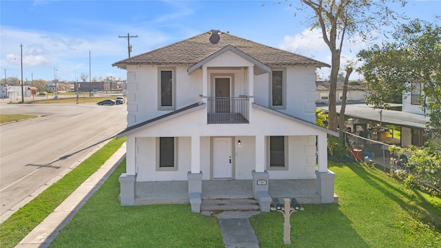 bungalow-style house with a front yard